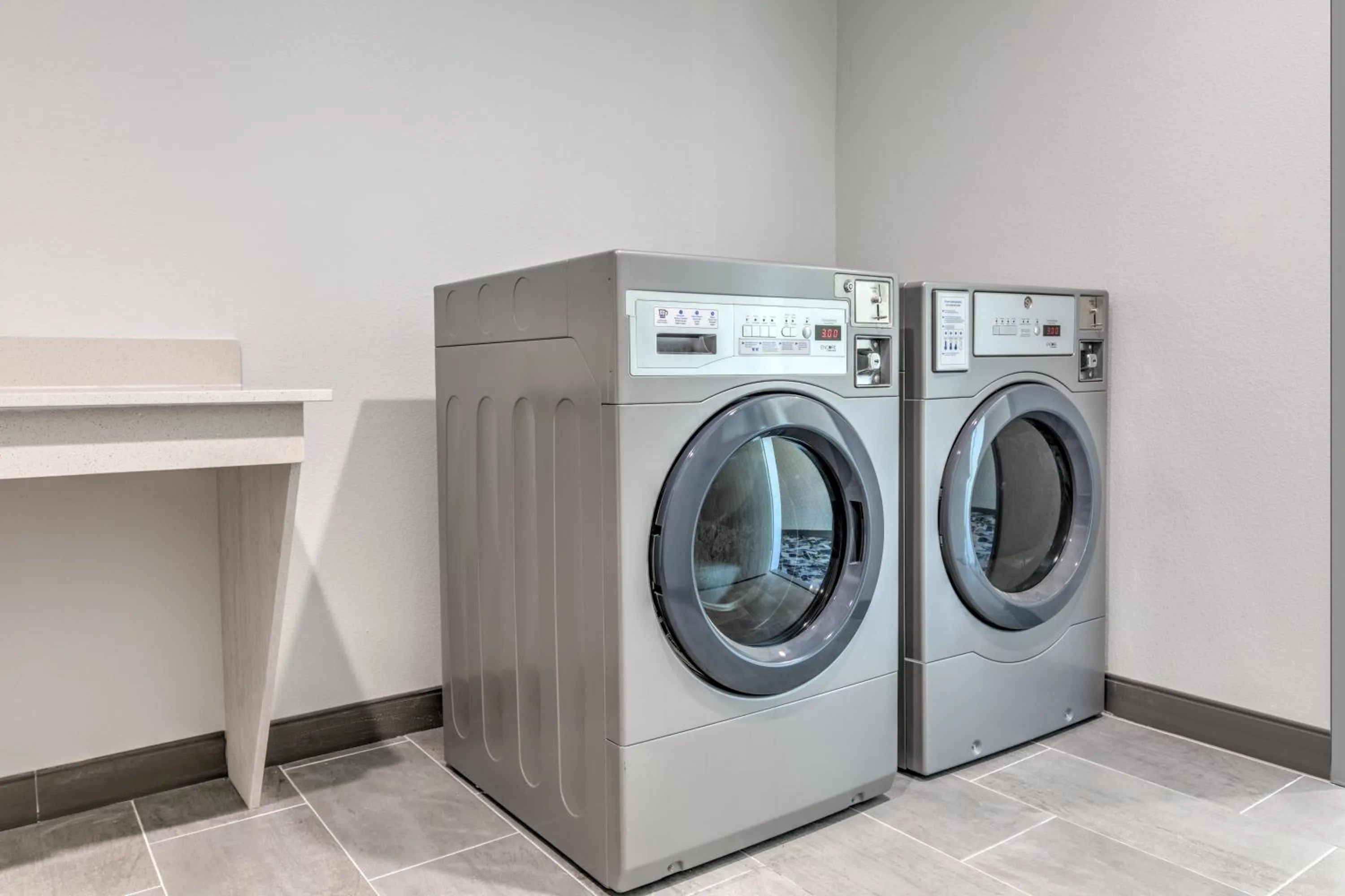 laundry in Hampton Inn & Suites by Hilton Shenandoah The Woodlands