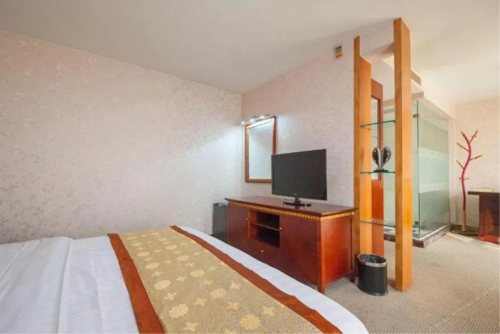 Bed in Nantong GuoDu Hotel