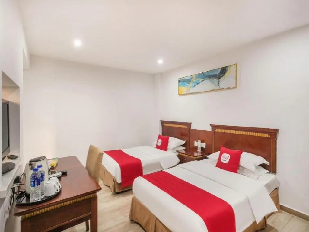 Bed in Nantong GuoDu Hotel