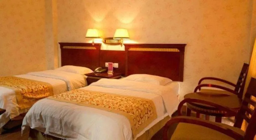 Bed in Nantong GuoDu Hotel