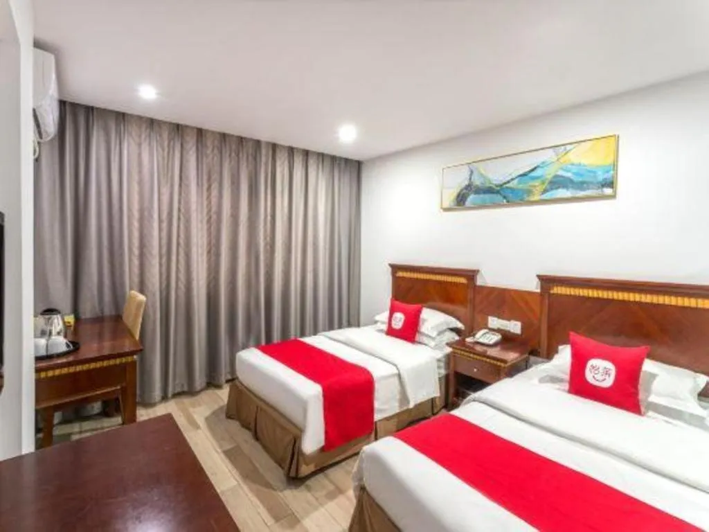 Bed in Nantong GuoDu Hotel