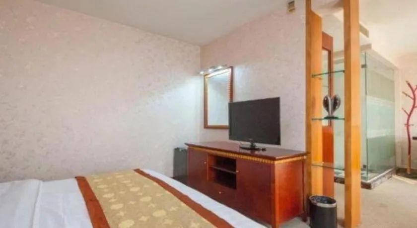 Bed in Nantong GuoDu Hotel