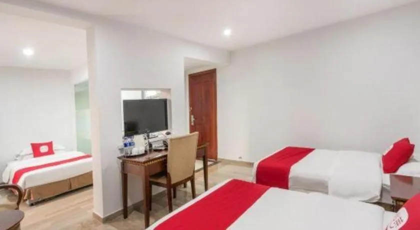 Bed in Nantong GuoDu Hotel