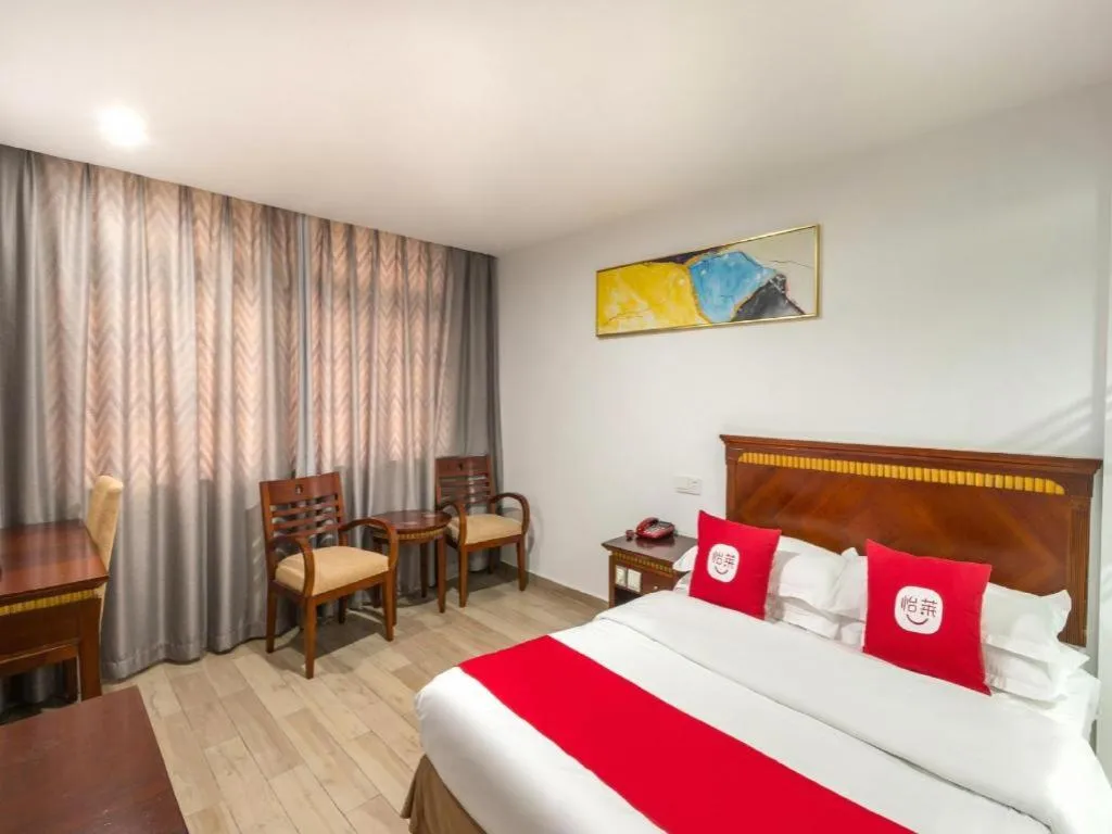 Bed in Nantong GuoDu Hotel