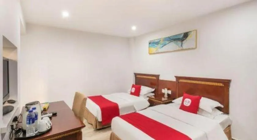 Bed in Nantong GuoDu Hotel