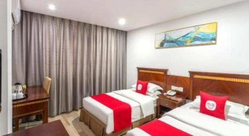 Bed in Nantong GuoDu Hotel
