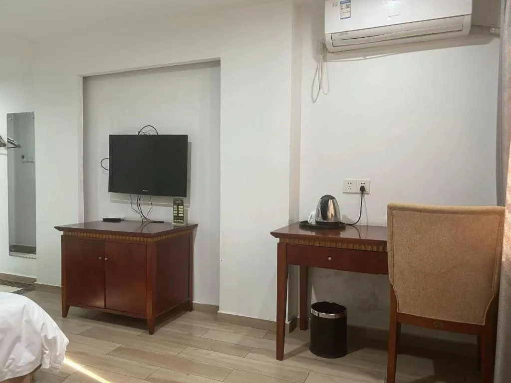 Bed in Nantong GuoDu Hotel