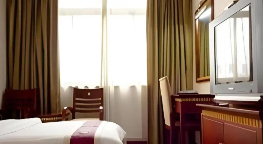 Bed in Nantong GuoDu Hotel