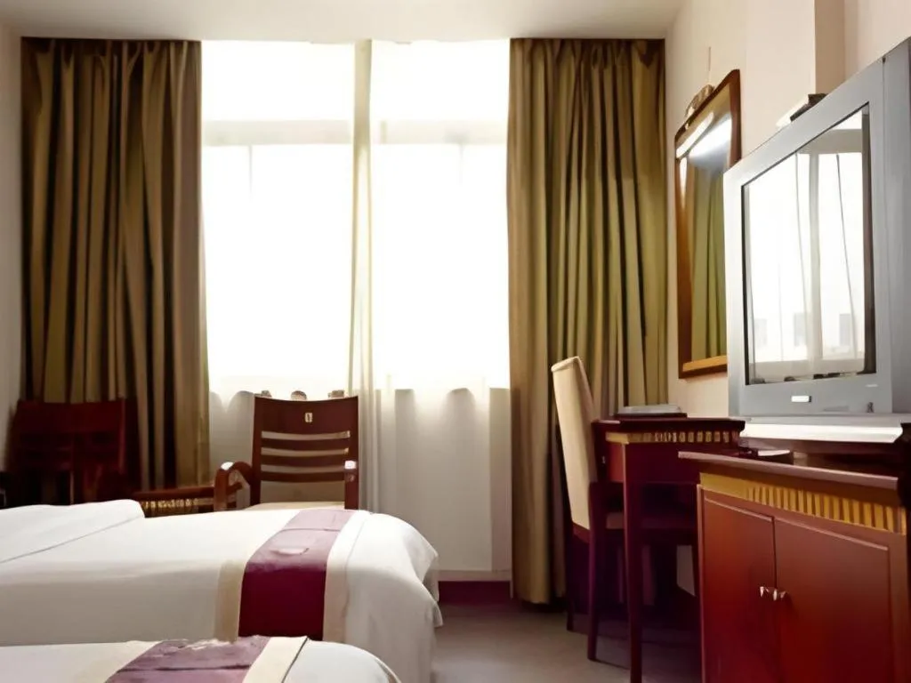 Bed in Nantong GuoDu Hotel