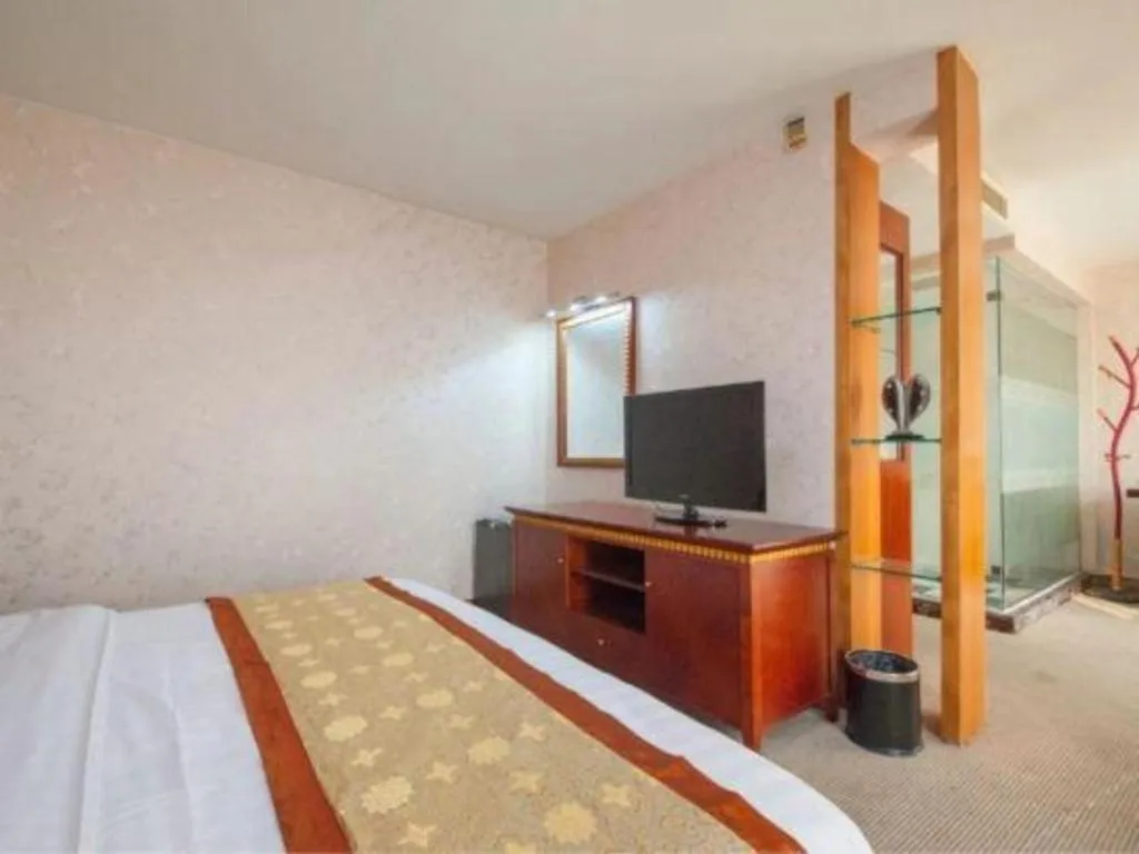 Bed in Nantong GuoDu Hotel