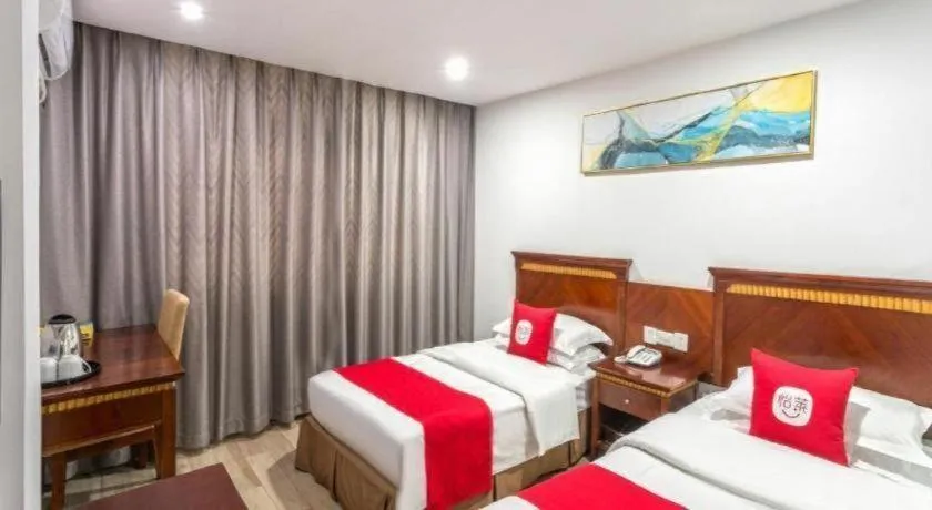 Bed in Nantong GuoDu Hotel
