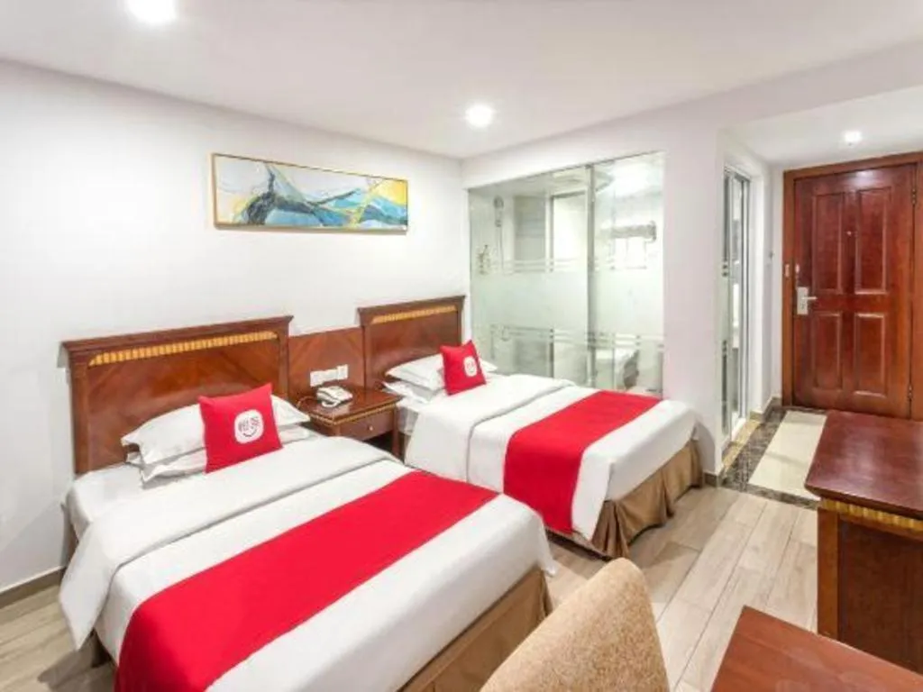 Bed in Nantong GuoDu Hotel