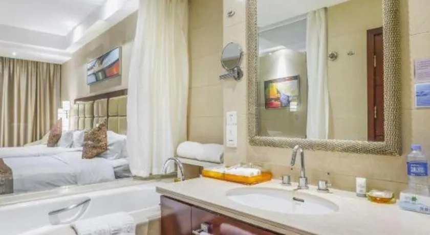 Bed in Zhongzhou International Hotel