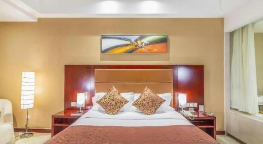 Bed in Zhongzhou International Hotel