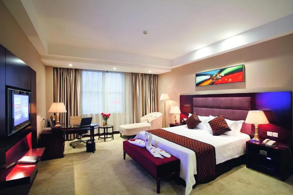 Bed in Zhongzhou International Hotel