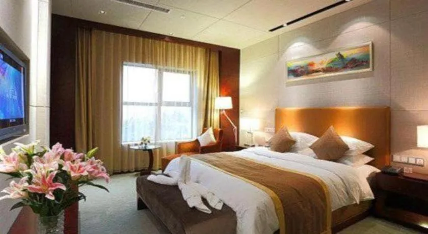 Bed in Zhongzhou International Hotel