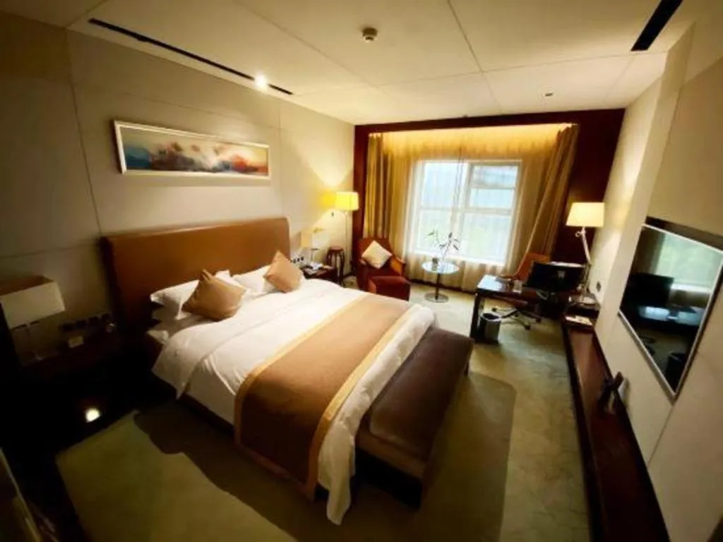 Bed in Zhongzhou International Hotel