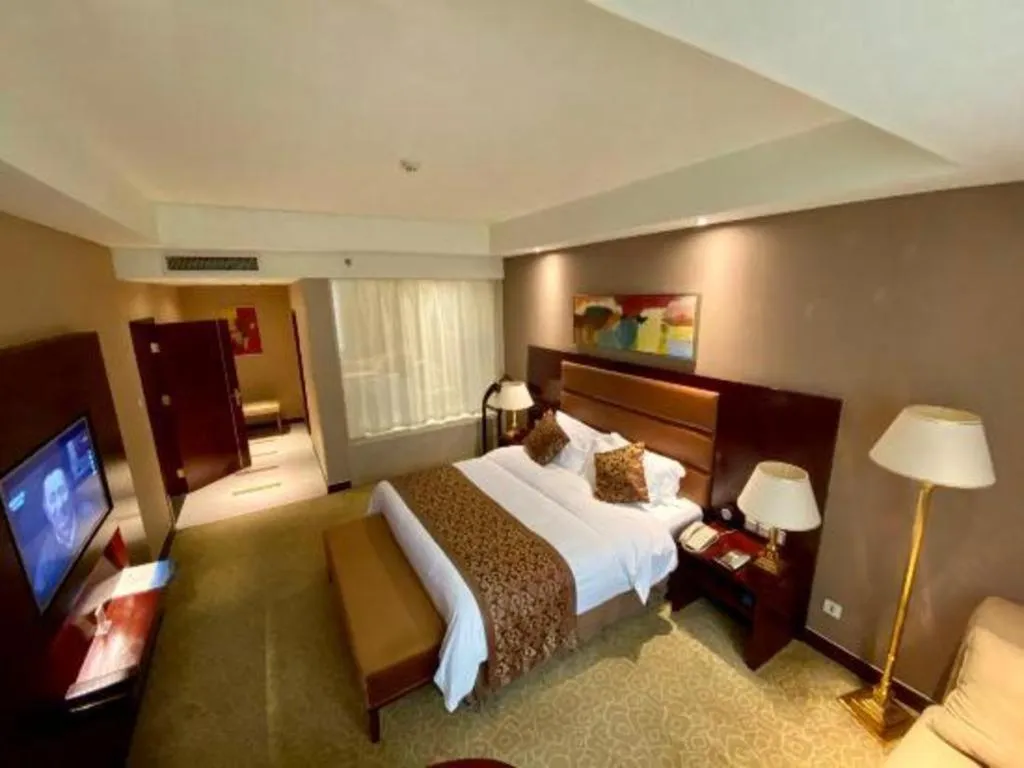 Bed in Zhongzhou International Hotel