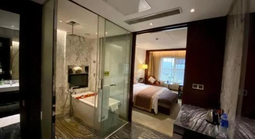 Bed in Zhongzhou International Hotel