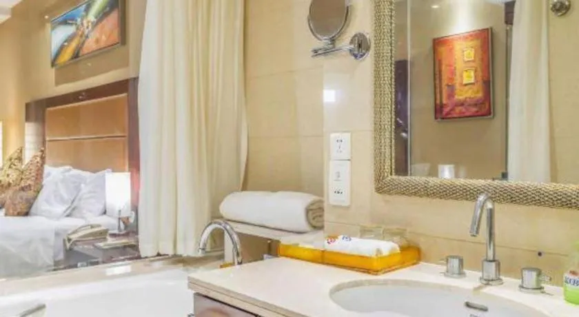 Bed in Zhongzhou International Hotel