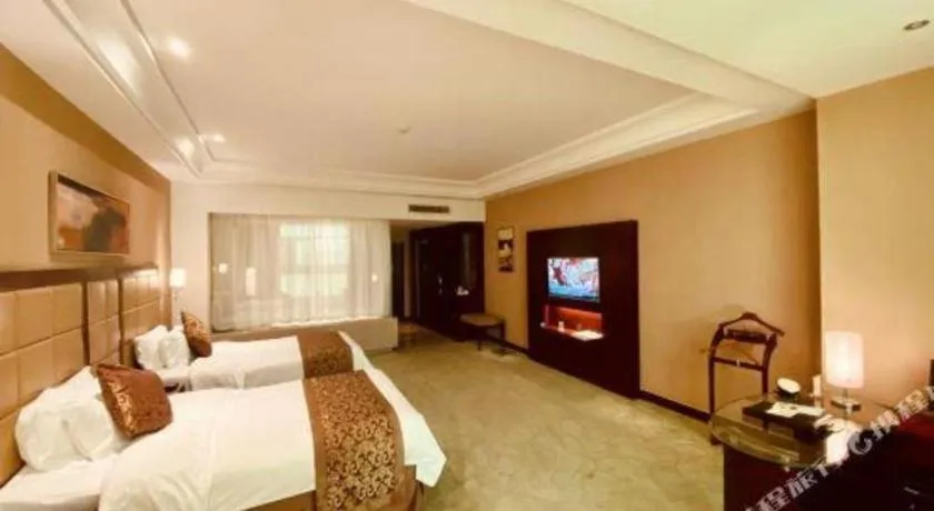 Bed in Zhongzhou International Hotel