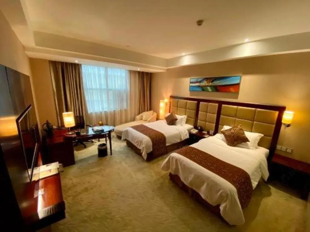 Bed in Zhongzhou International Hotel