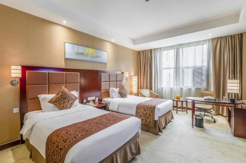 Bed in Zhongzhou International Hotel