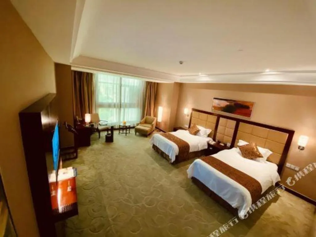 Bed in Zhongzhou International Hotel