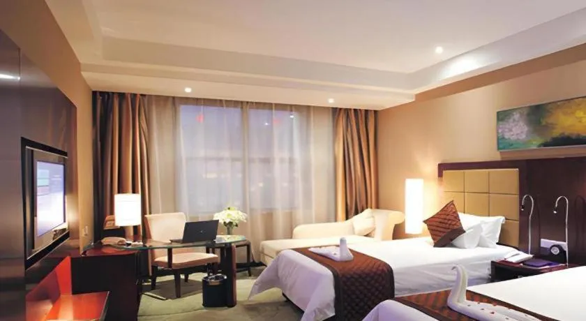 Bed in Zhongzhou International Hotel