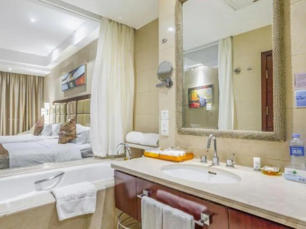 Bed in Zhongzhou International Hotel