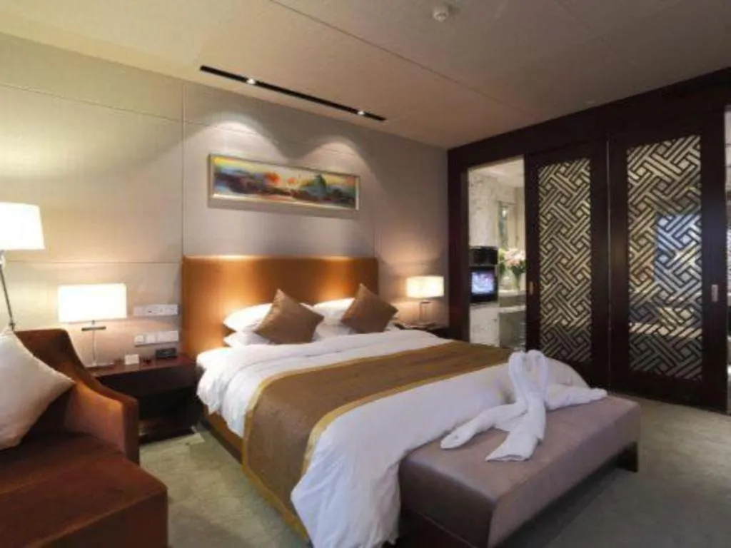 Bed in Zhongzhou International Hotel