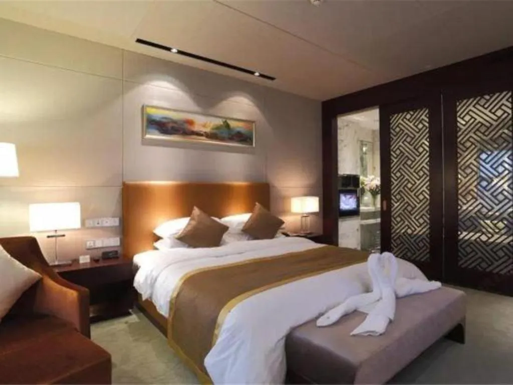 Bed in Zhongzhou International Hotel