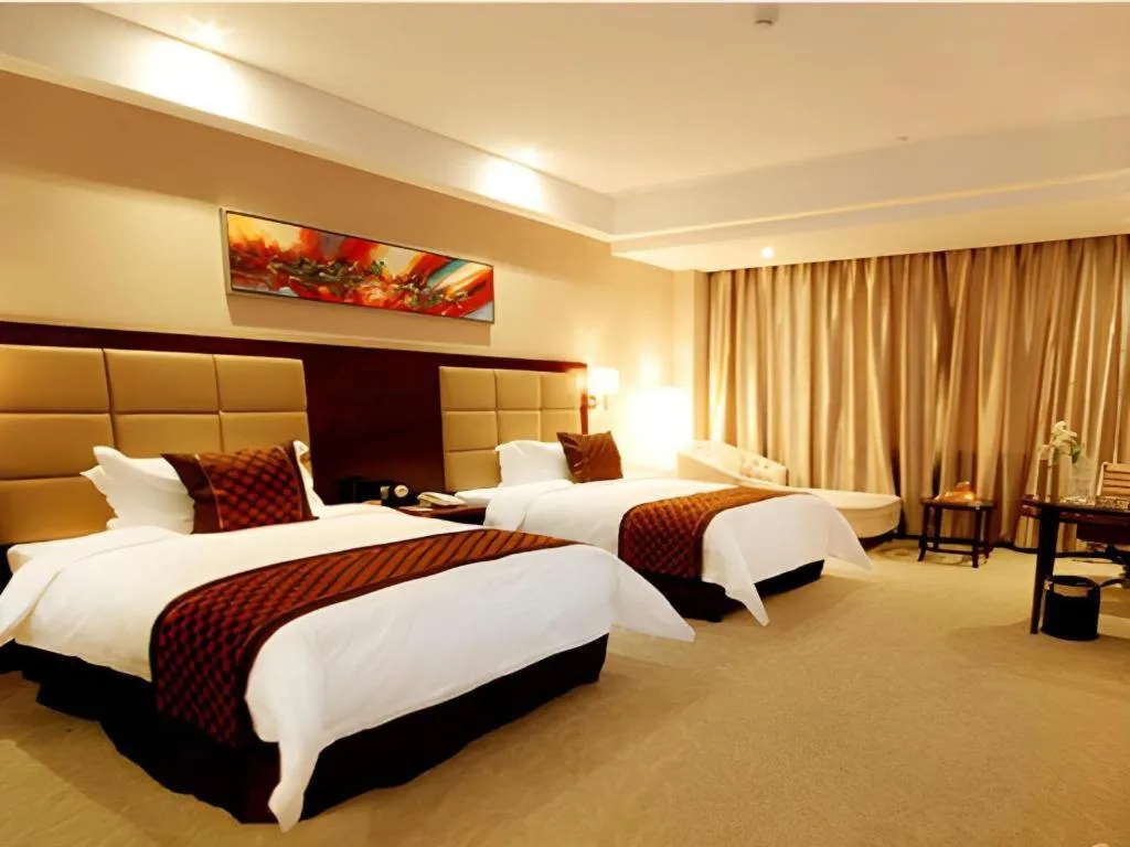 Bed in Zhongzhou International Hotel