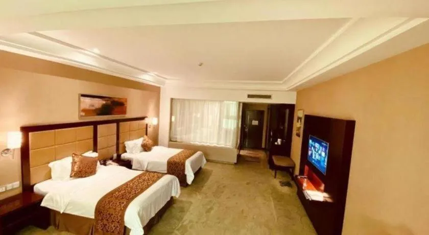 Bed in Zhongzhou International Hotel