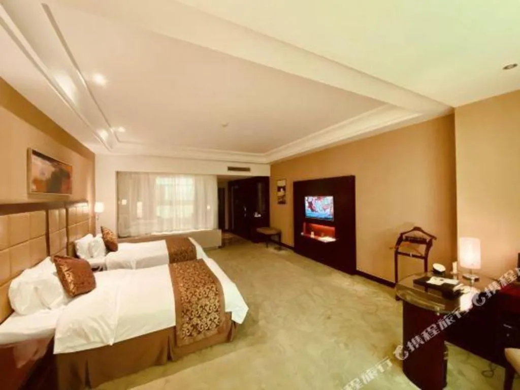 Bed in Zhongzhou International Hotel