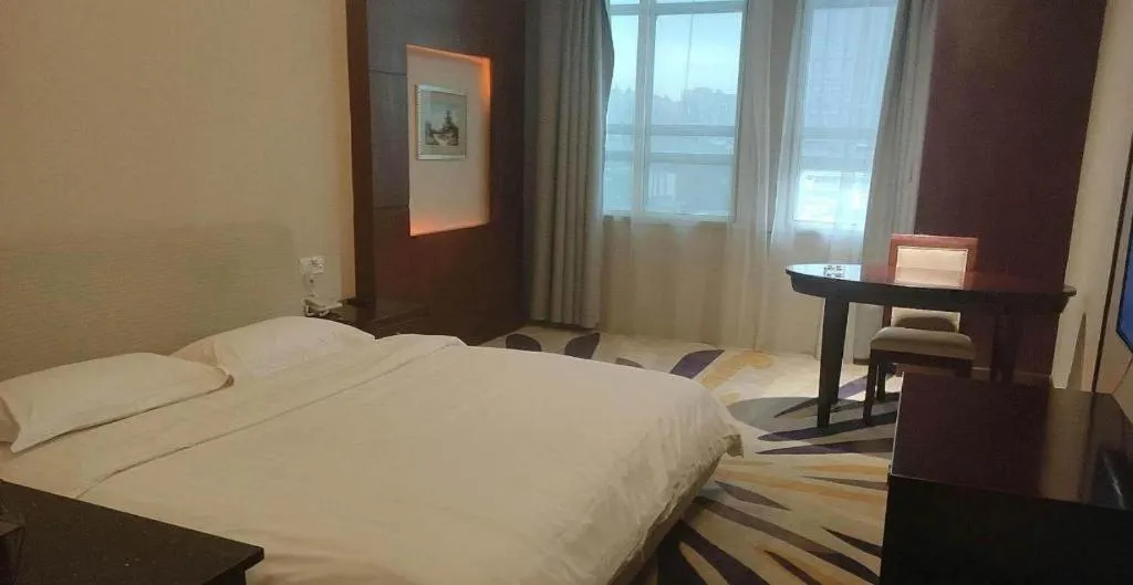 Bed in Wanyi Hotel