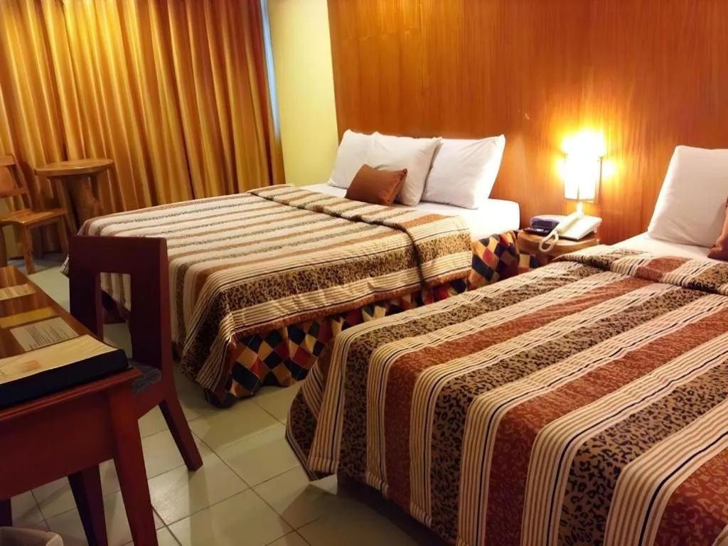 Bed in Hotel Asuncion