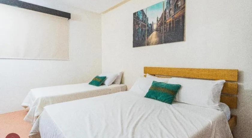 Bed in Quezon Premier Hotel - Candelaria