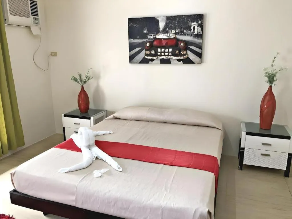 Bed in Sioland Grand Premier Hotel Candelaria