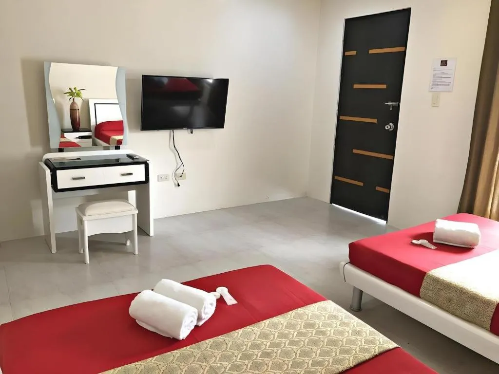 Bed in Quezon Premier Hotel - Candelaria