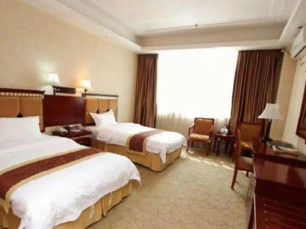 Bed in Shengshi Jinhua Hotel