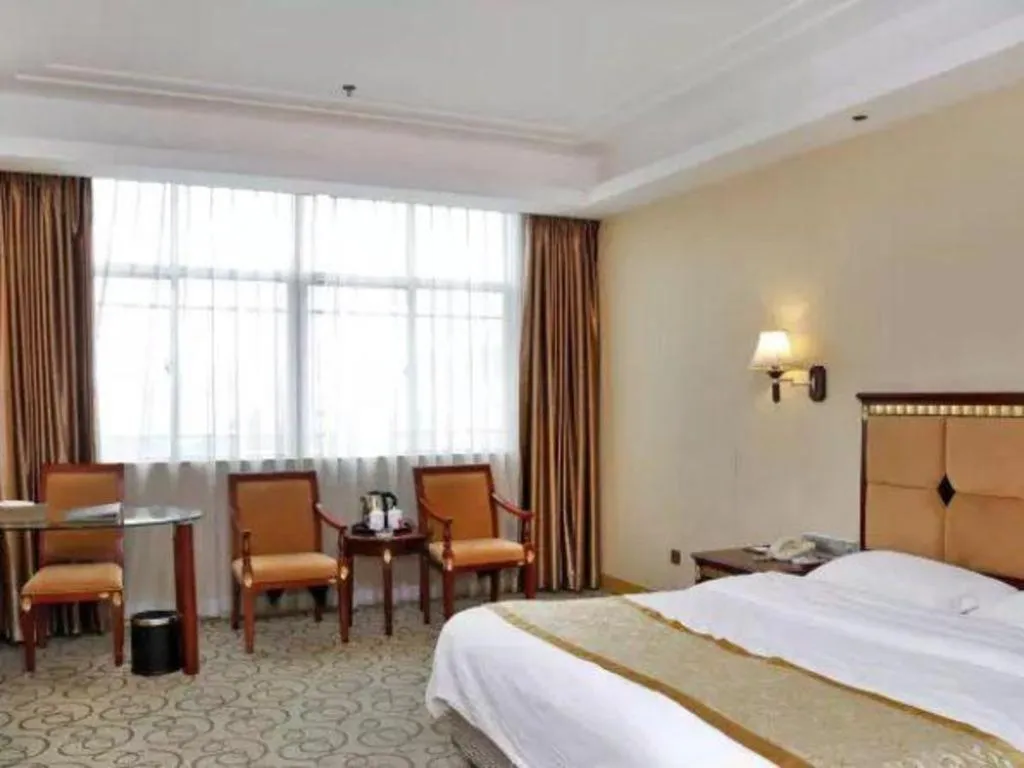 Bed in Shengshi Jinhua Hotel