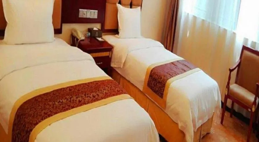 Bed in Shengshi Jinhua Hotel