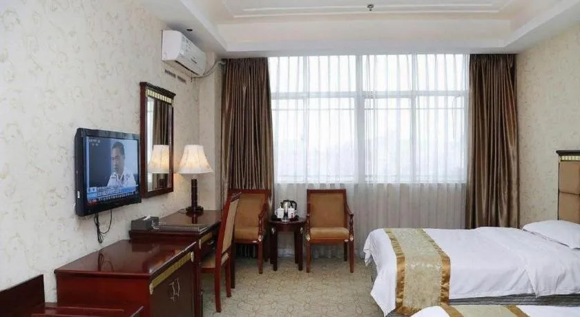 Bed in Shengshi Jinhua Hotel