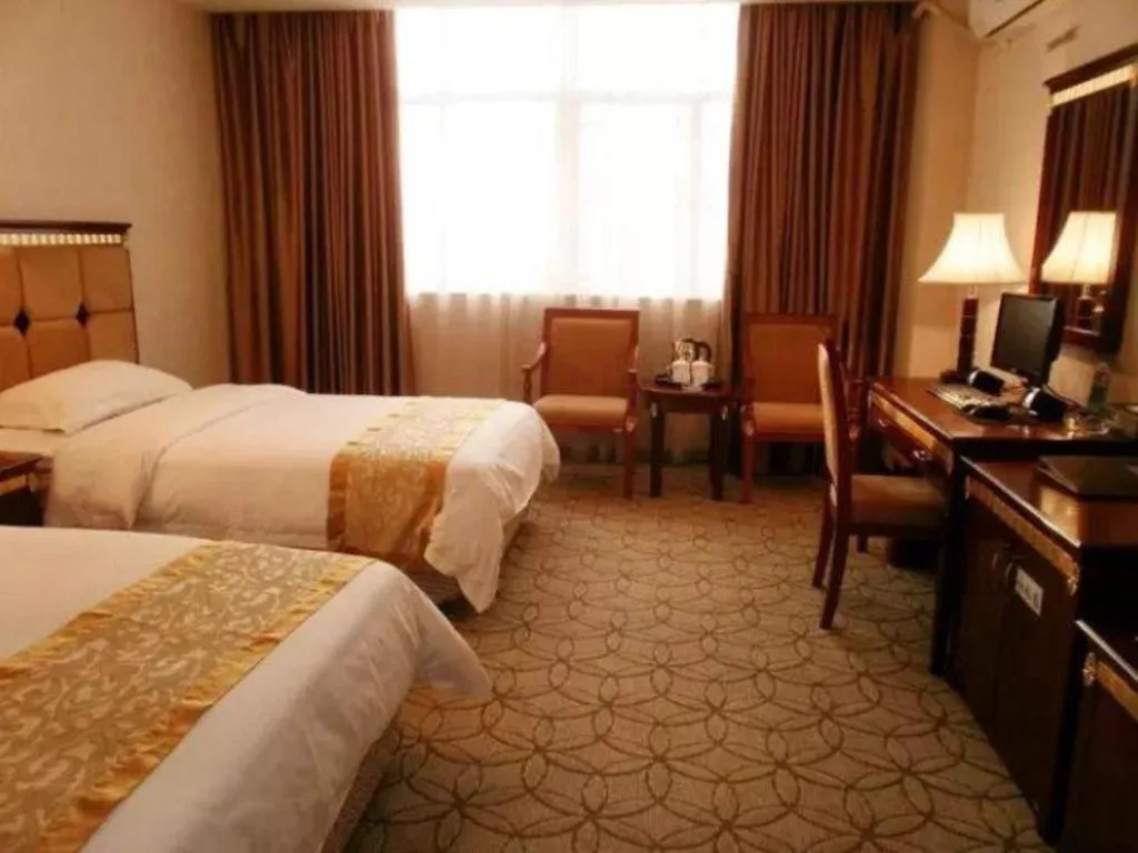 Bed in Shengshi Jinhua Hotel