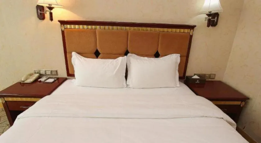 Bed in Shengshi Jinhua Hotel