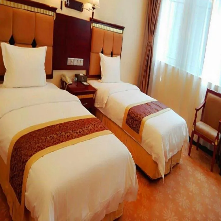 Bed in Shengshi Jinhua Hotel