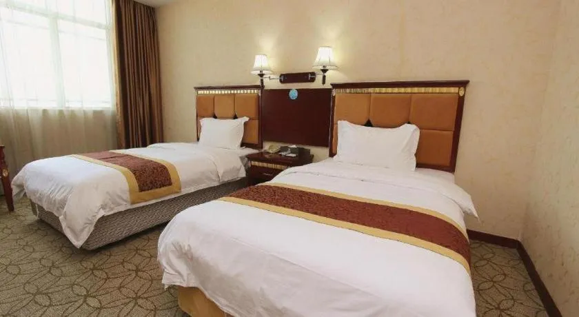 Bed in Shengshi Jinhua Hotel