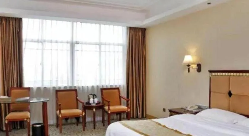 Bed in Shengshi Jinhua Hotel