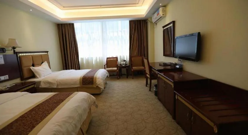 Bed in Shengshi Jinhua Hotel